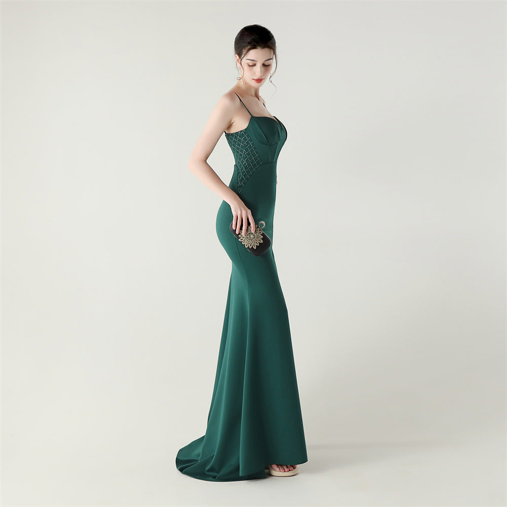 Emerald Radiance Fishbone Beaded Gown